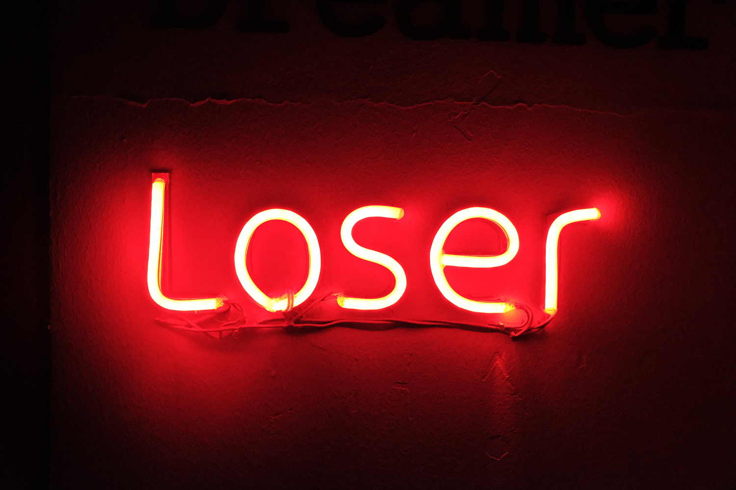 red-neon-sign-that-says-loser